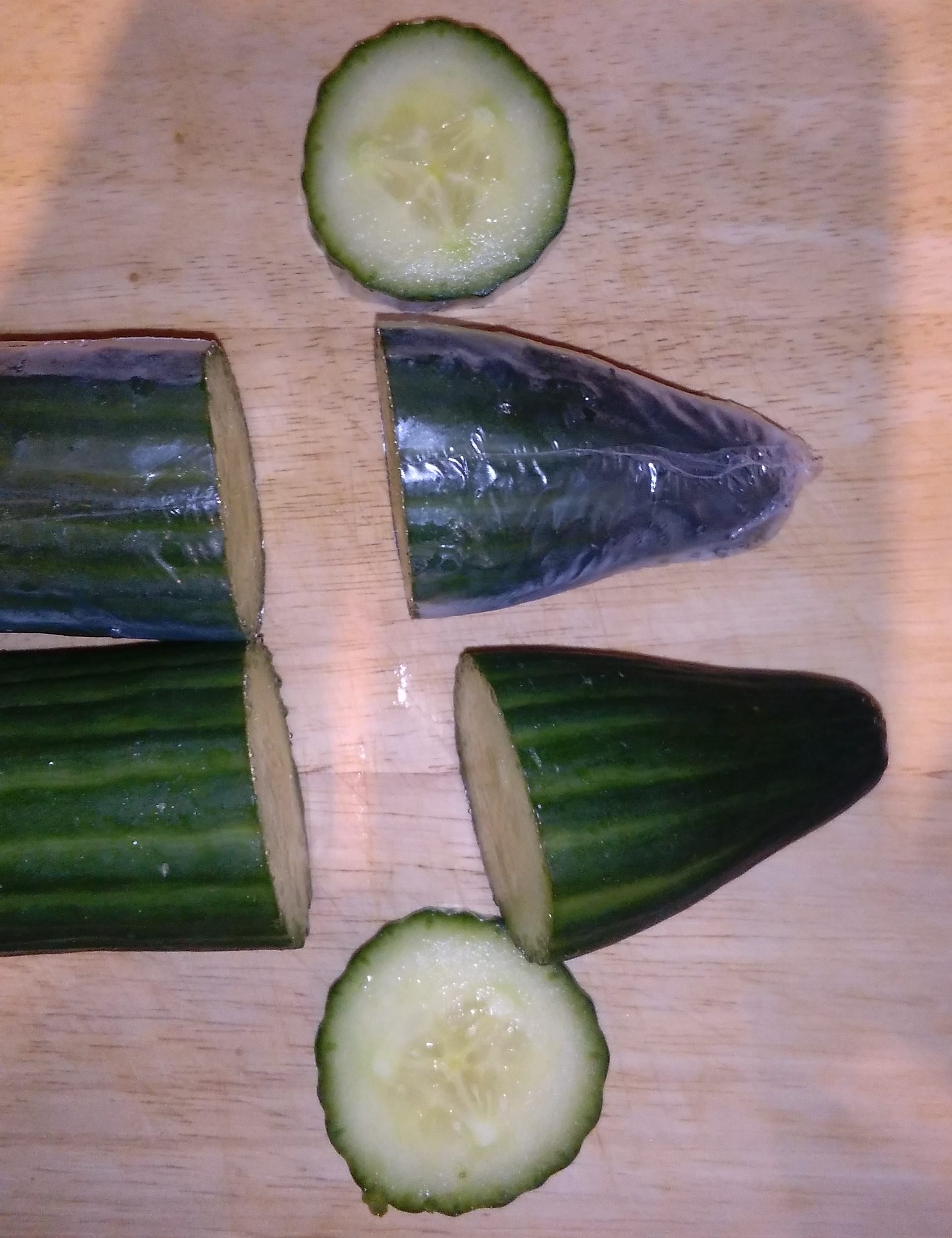 Wrapped and unwrapped cucumbers